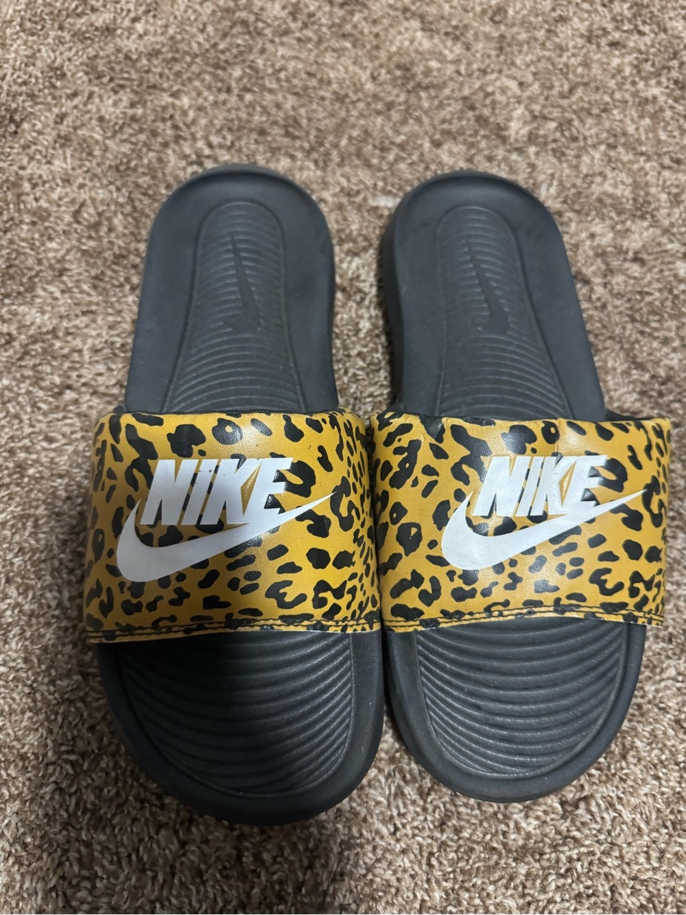 Nike Black Slide Sandals with Yellow Leopard Accent